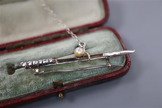 A Victorian yellow metal, rose cut diamond and pearl set arrow brooch, 45mm, gross 2.4 grams, in fitted box.